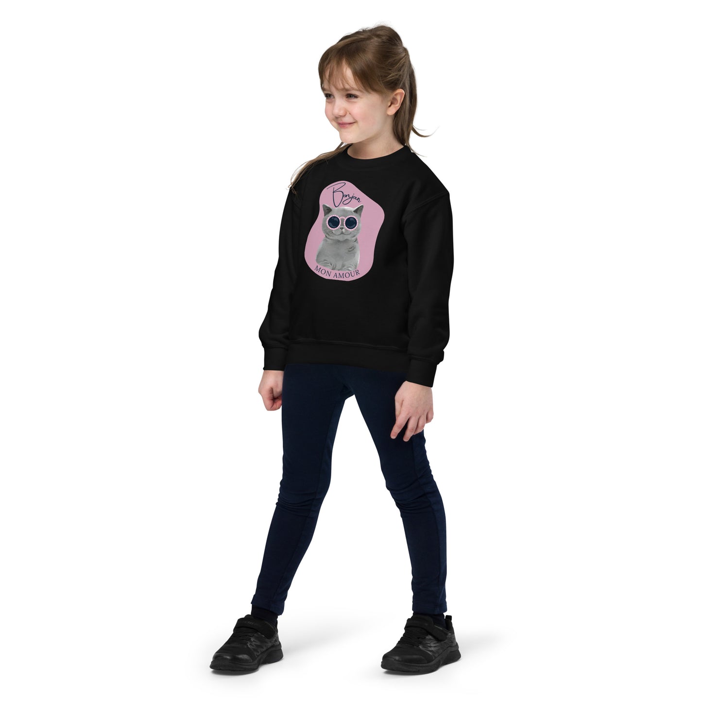 Child wearing Pet Treasures Studio black Bonjour Mon Amour crewneck for kids with cute cat graphic