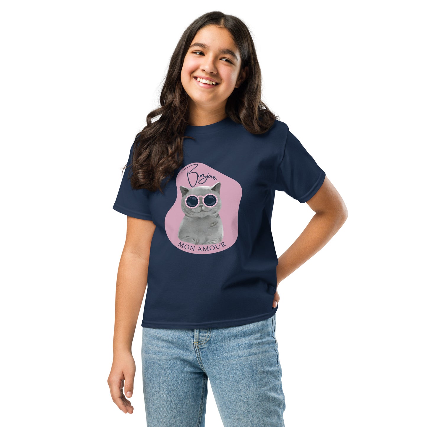 Girl wearing a navy Bonjour Mon Amour shirt for children with a cat graphic and sunglasses