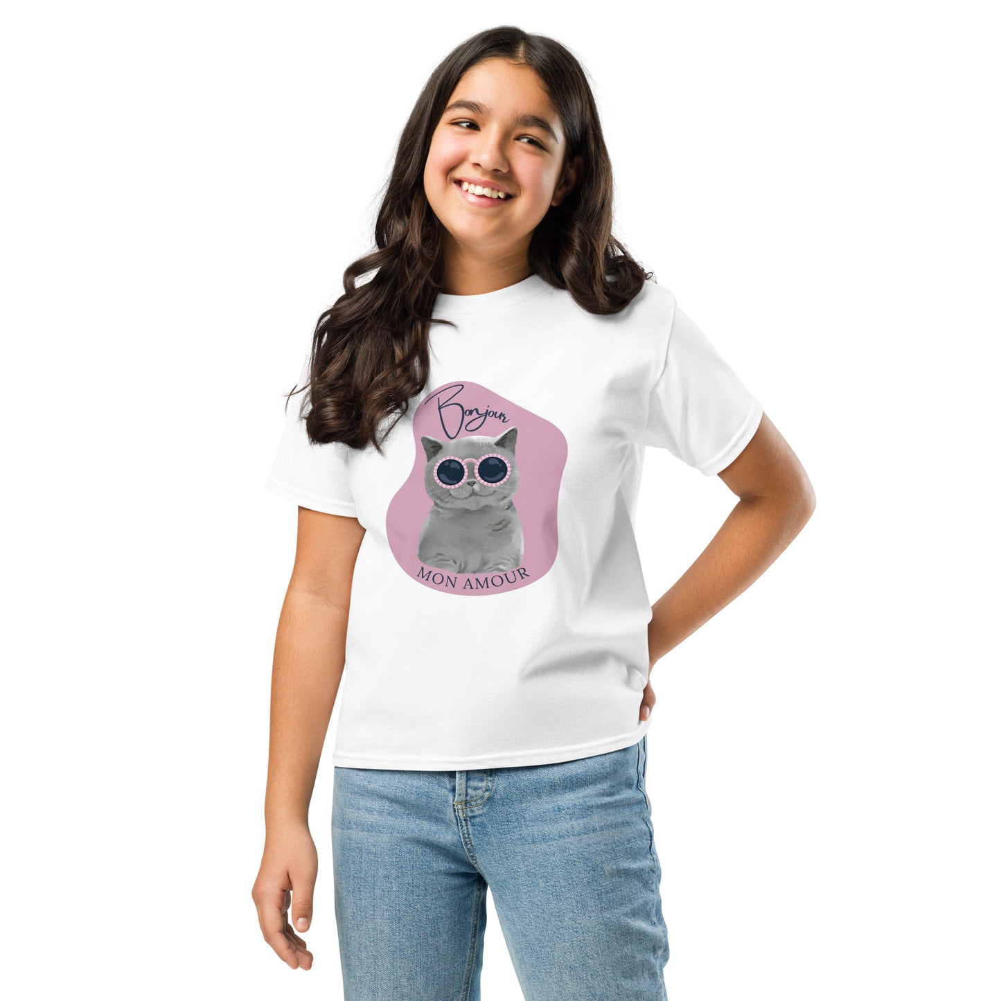 Girl wearing a white Bonjour Mon Amour shirt for children with a cat graphic and sunglasses