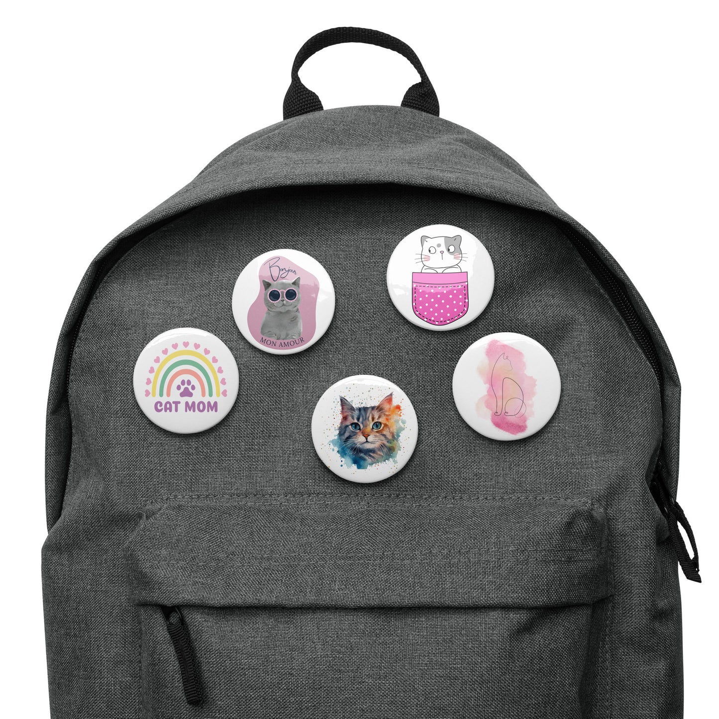 Pet Treasures Studio cat pin buttons attached to a gray backpack with cute cat designs