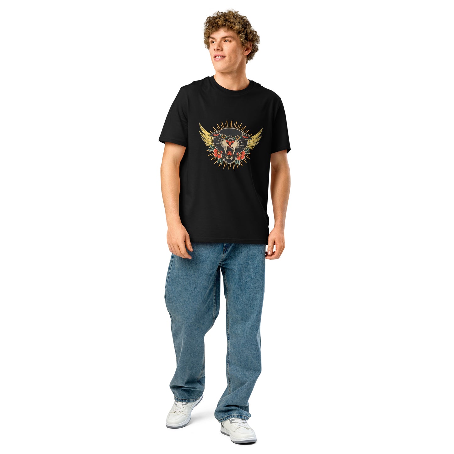 Male model wearing Pet Treasures Studio black tee featuring a winged wild cat emblem and roses wild cat organic cotton t-shirt