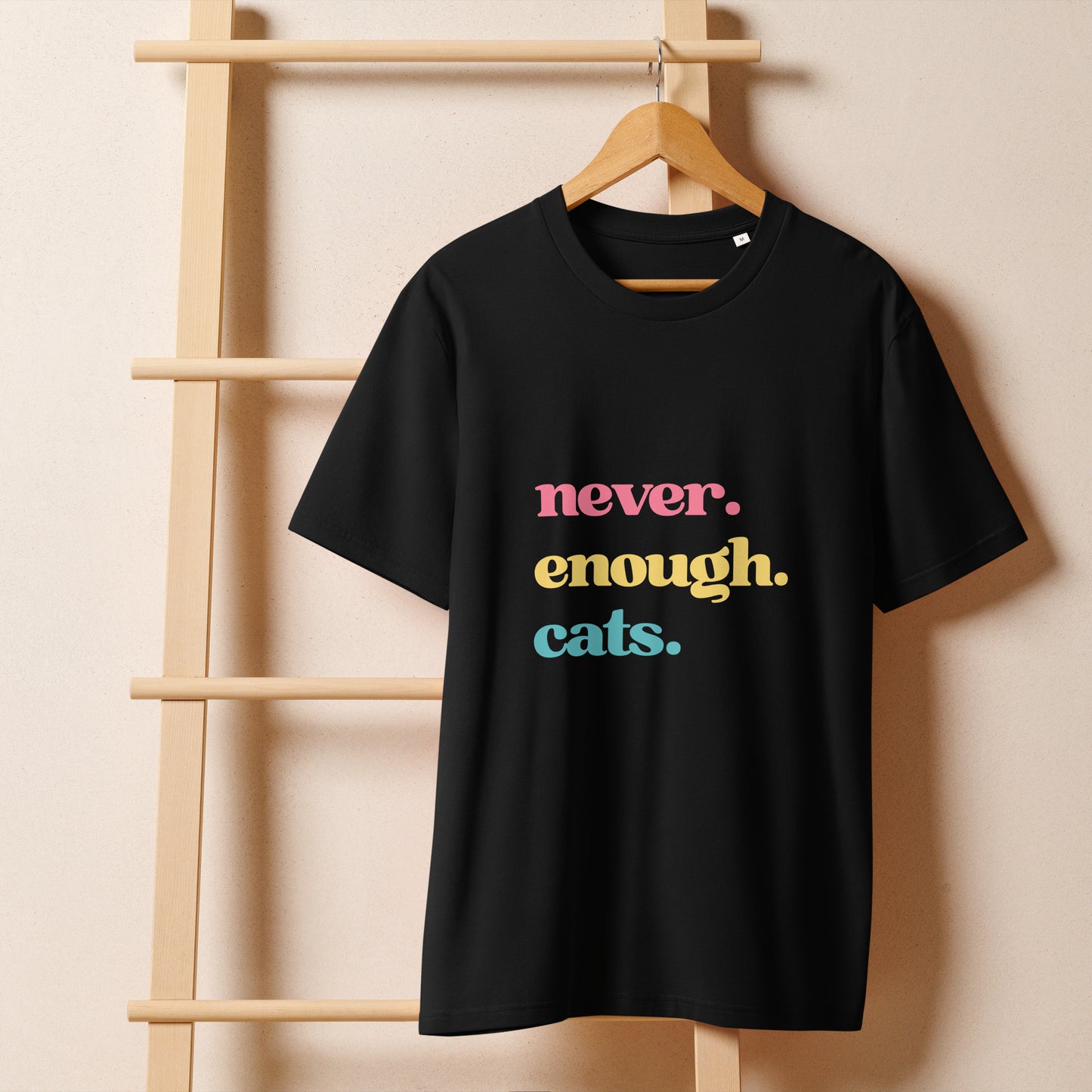 Black never enough cats tee featuring colourful text for cat lovers