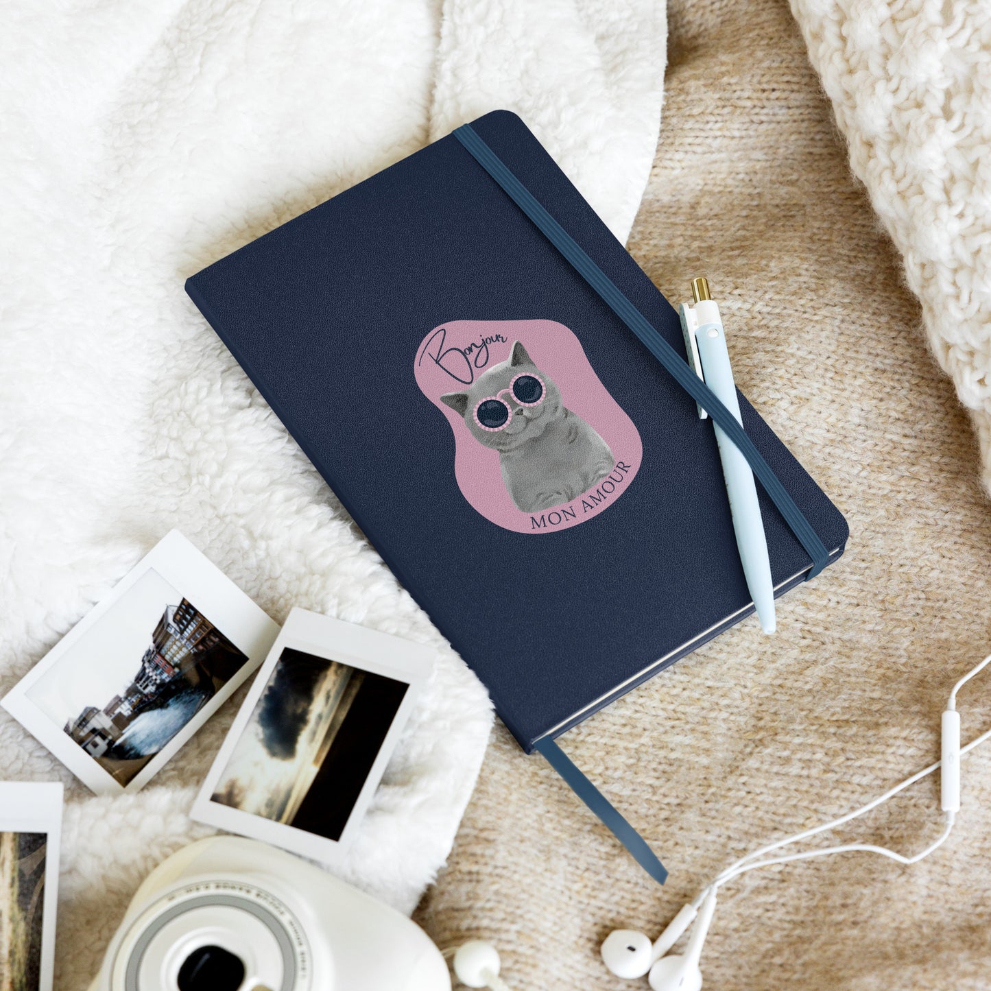 Bonjour Mon Amour journal by Pet Treasures Studio with a cat design, navy cover, pen, and elastic band