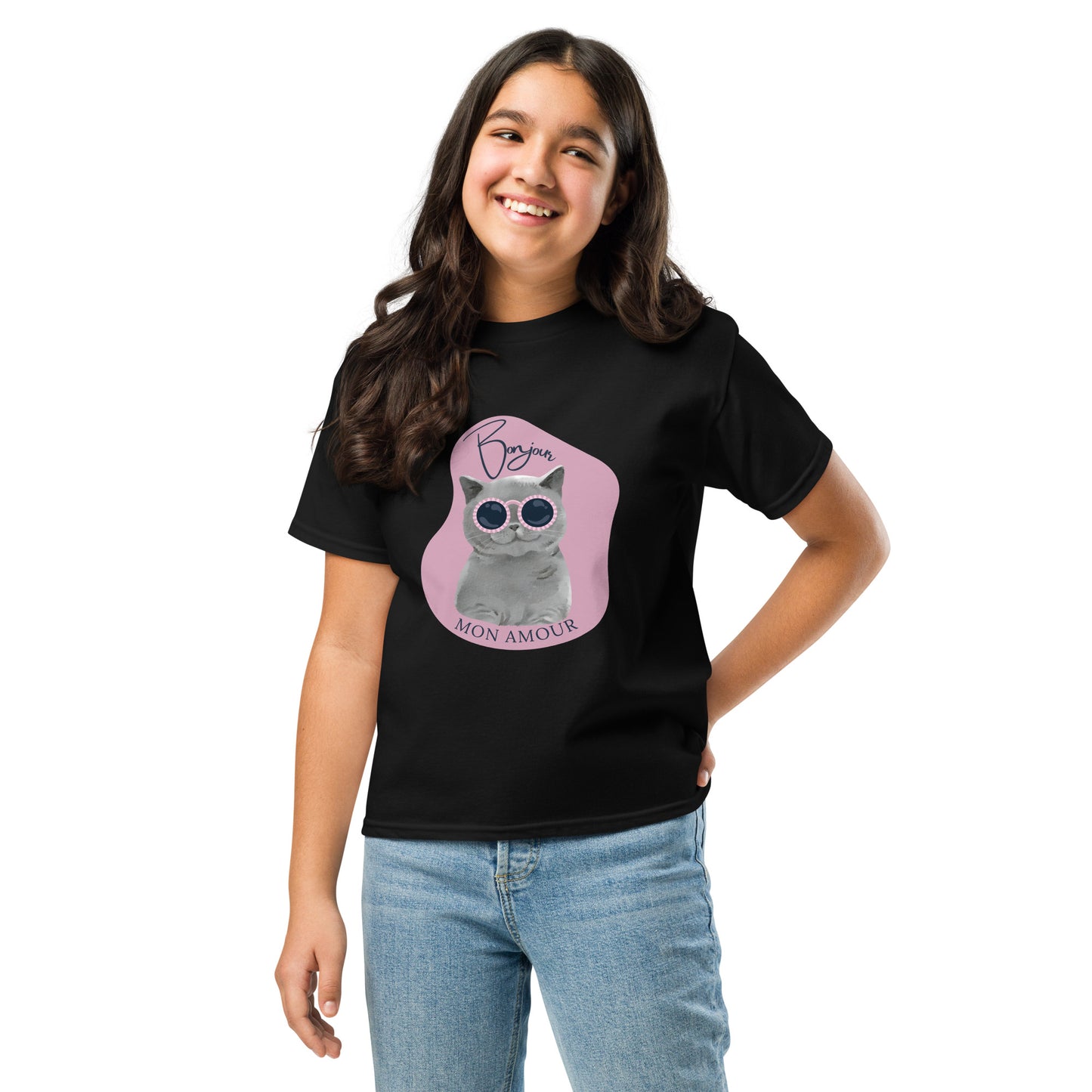 Smiling child wearing black Bonjour Mon Amour shirt for children with cat graphic and sunglasses