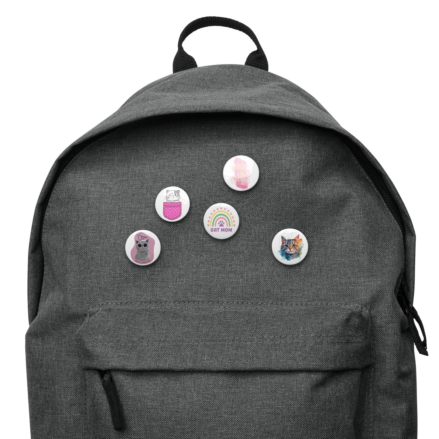Gray backpack decorated with colorful cat pin buttons featuring various cat designs