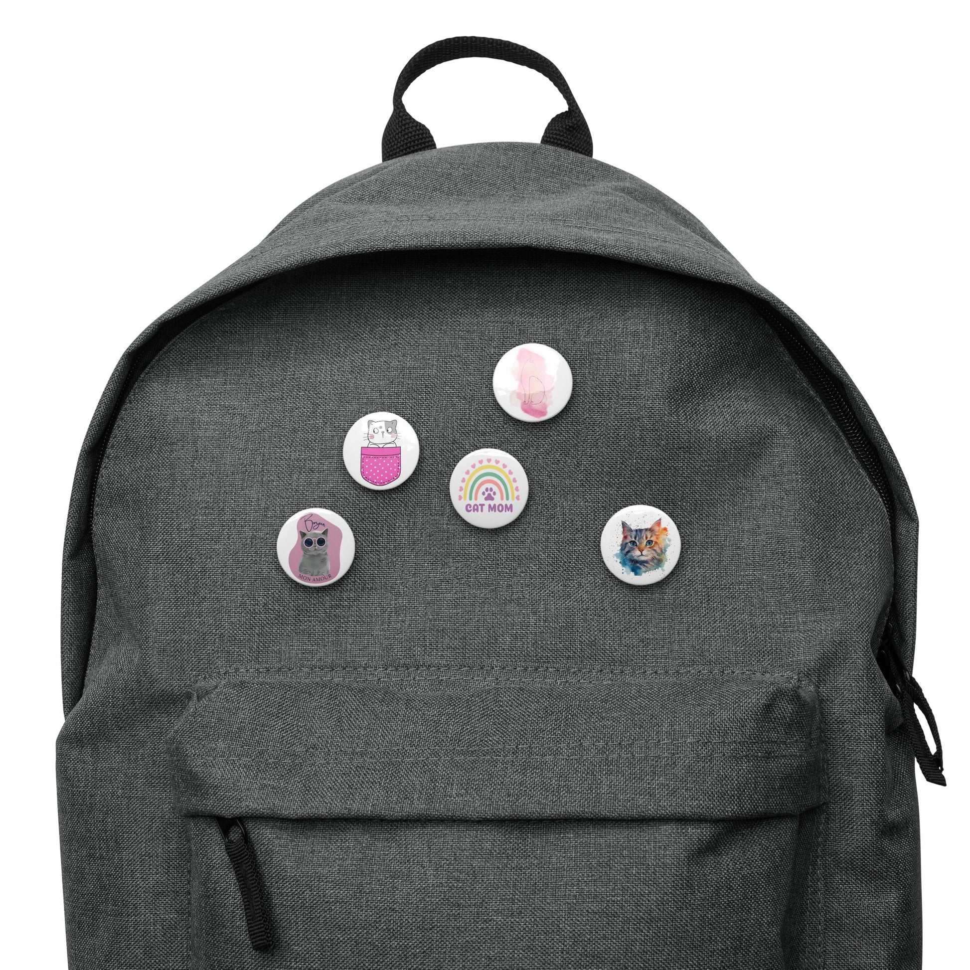 Gray backpack decorated with colorful cat pin buttons featuring various cat designs
