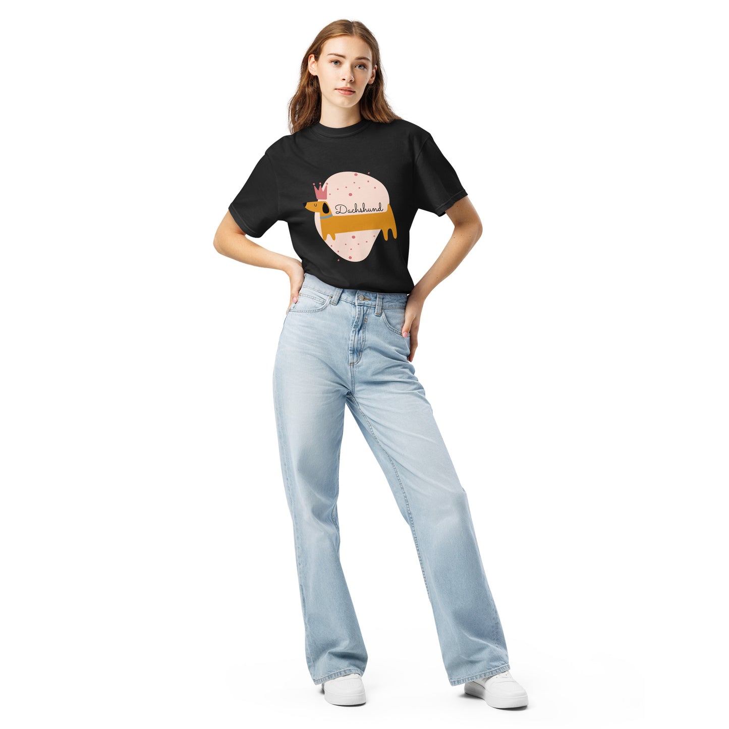 Woman wearing black dachshund graphic t-shirt with light blue jeans and white sneakers