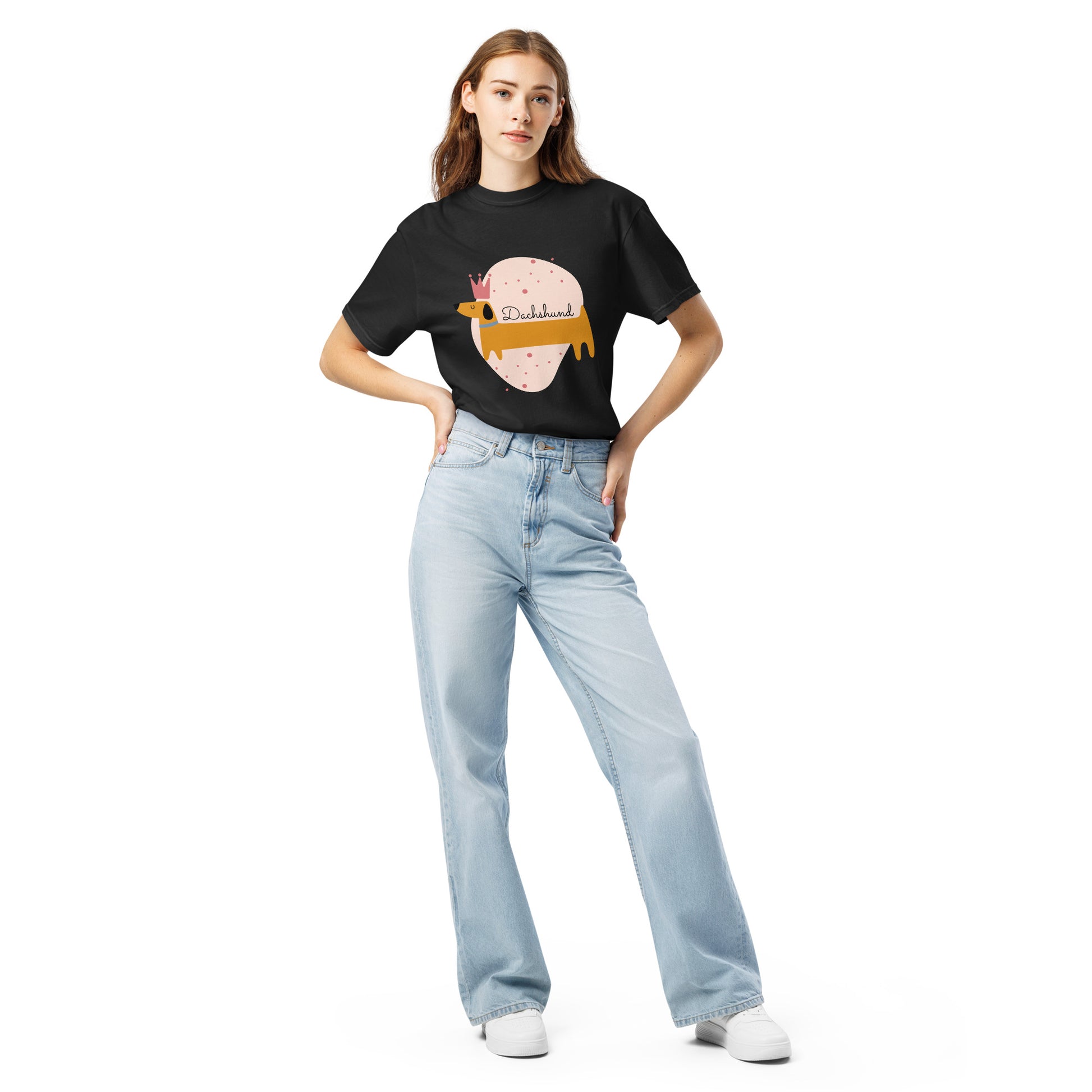 Woman wearing black dachshund graphic t-shirt with light blue jeans and white sneakers