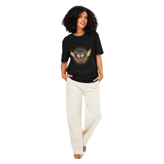 Pet Treasures Studio model wearing black wild cat organic cotton t-shirt with colourful feline sun graphic and cream trousers