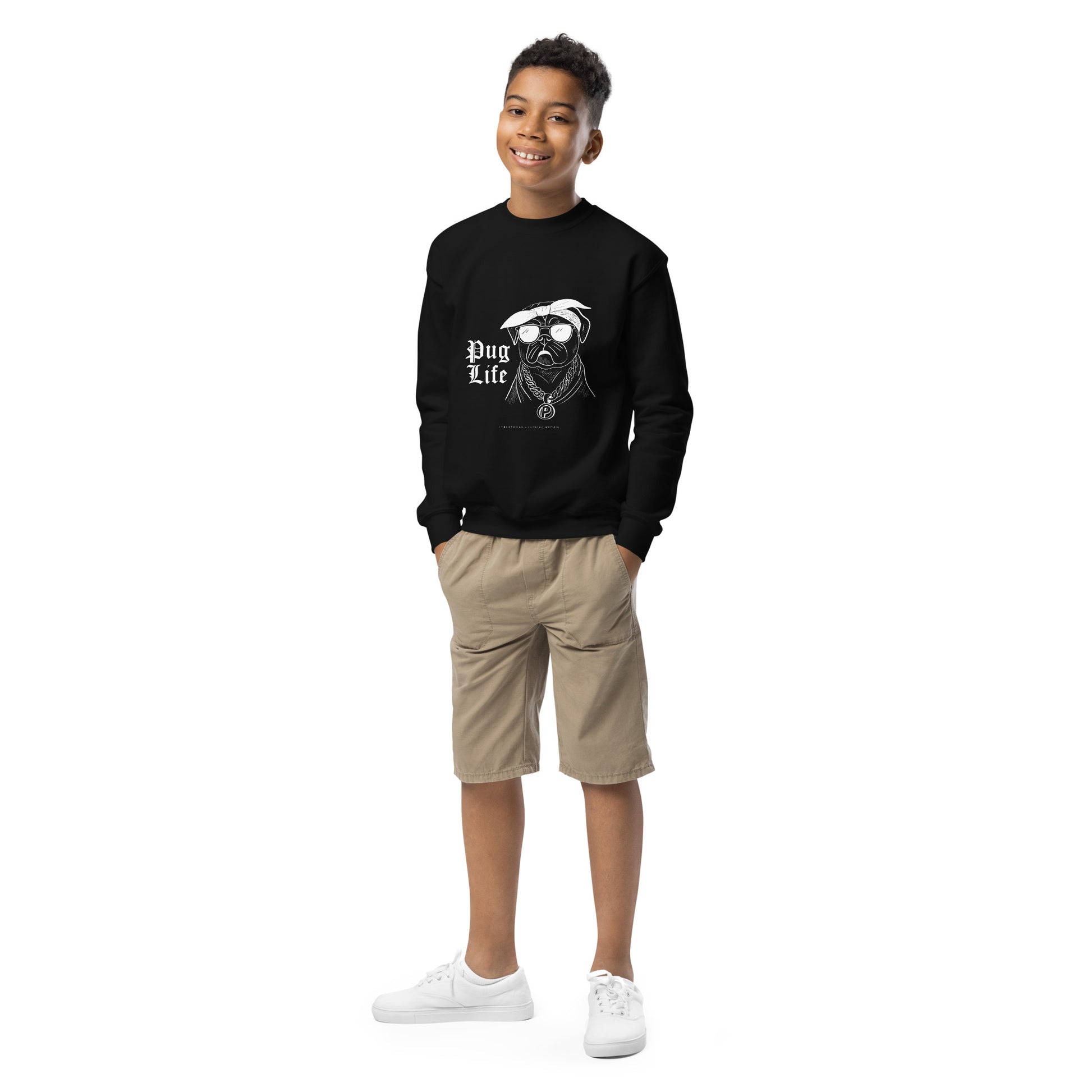 Boy wearing Pet Treasures Studio black kids pug themed clothing sweatshirt with pug graphic and khaki shorts
