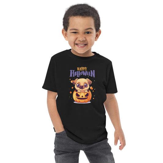 Cute toddler wearing a Pumpkin Dog Halloween T-Shirt for Toddlers with a smiling pug and pumpkin design
