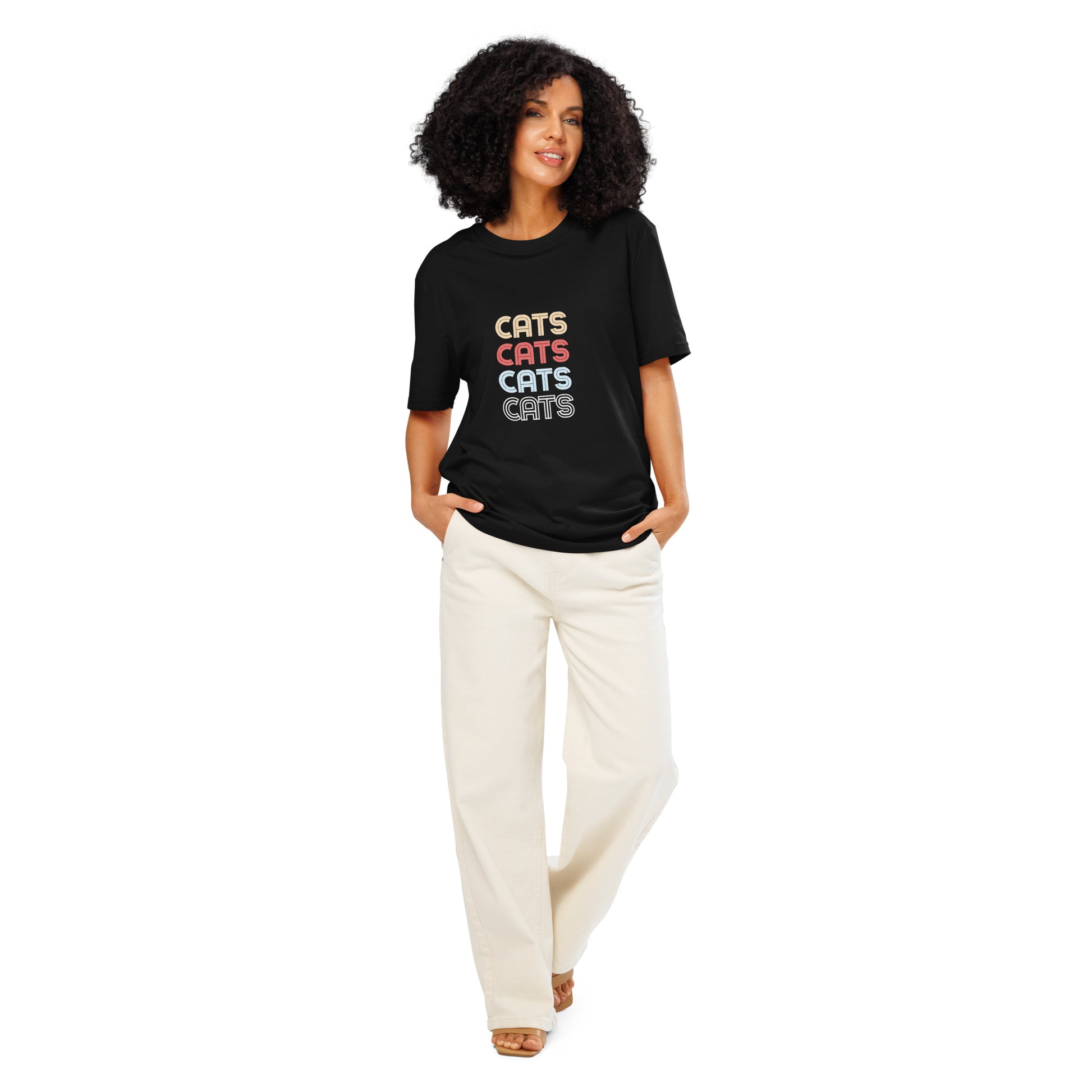 Pet Treasures Studio black cats t-shirt for cat lovers with stacked multicolour text worn by model in cream trousers
