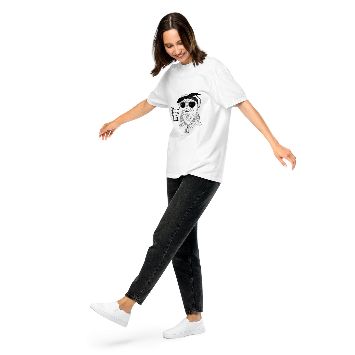 Pet Treasures Studio pug graphic t-shirt unisex worn by smiling woman in white with black jeans and white sneakers